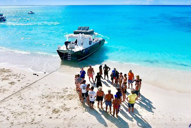 4hour Group Half Day Snorkeling Excursion in Grace Bay - The final swim: rooftop jumping board and curved slides