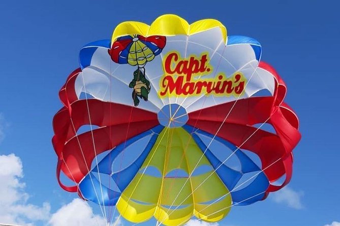 Capt Marvin Watersports / Parasail - Private Tour - Boarding a boat built for parasailing