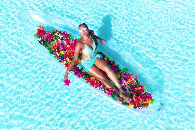 Clear Kayak Flower Girl Photoshoot in Turks and Caicos Islands - A floating flower set at Leeward Beach