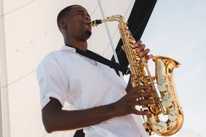 Deluxe Sunset and Saxophone Sail on Luxury Lady Grace Catamaran - Boarding at The Ritz-Carlton beach