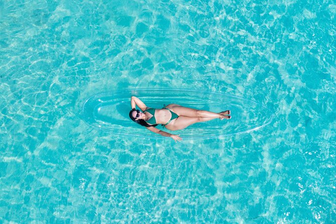 Drone Kayak Photoshoot - Pickup from your resort, with a practical warning