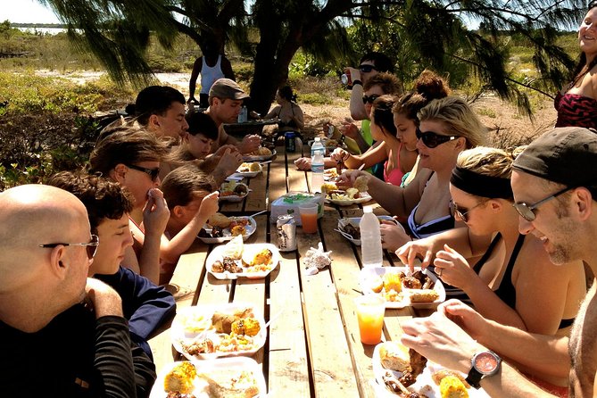 Full Day Beach BBQ Lunch & Snorkeling Excursion in Grace Bay - Beaches, Swimming, and the Boat’s Slide