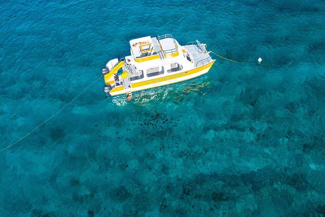 Full Day Private Boat Charter at Grace Bay, Providenciales - Unlimited drinks, shade, and the practical comforts