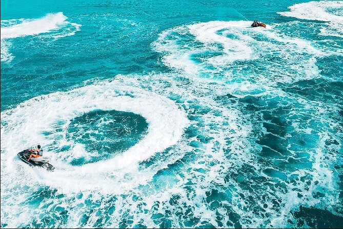 Jet Skiing around La famille ship and smaller pristine cays - Seeing the Ghost Ship in Seven Feet of Water