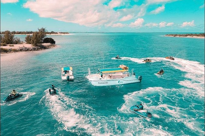 Jet Skiing around La famille ship and smaller pristine cays - Pickup, Check-In, and What to Bring