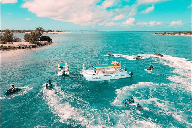 Jet Skiing around La famille ship and smaller pristine cays - Who Will Enjoy This Most?