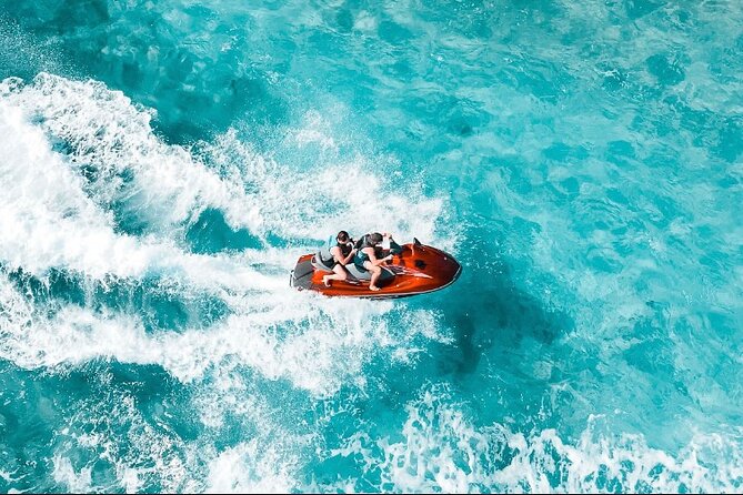 Jet Skiing around La famille ship and smaller pristine cays - From the Wreck to Iguana Island and Half Moon Bay