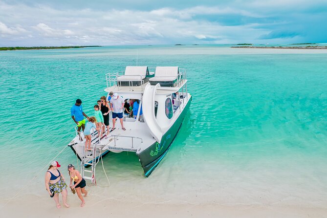 Private 4 Hour Power Catamaran Excursion in Grace Bay - Fishing and the local conch experience