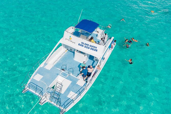 Private 7-Hour Catamaran Tour in Turks and Caicos - Half Moon Bay for beach time and a BBQ