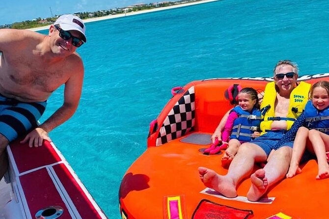 Tubing on grace bay beach Turks and caicos islands - The boat ride along the shoreline