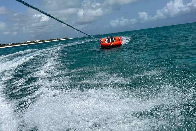 Tubing on grace bay beach Turks and caicos islands - The crew makes a short activity feel personal
